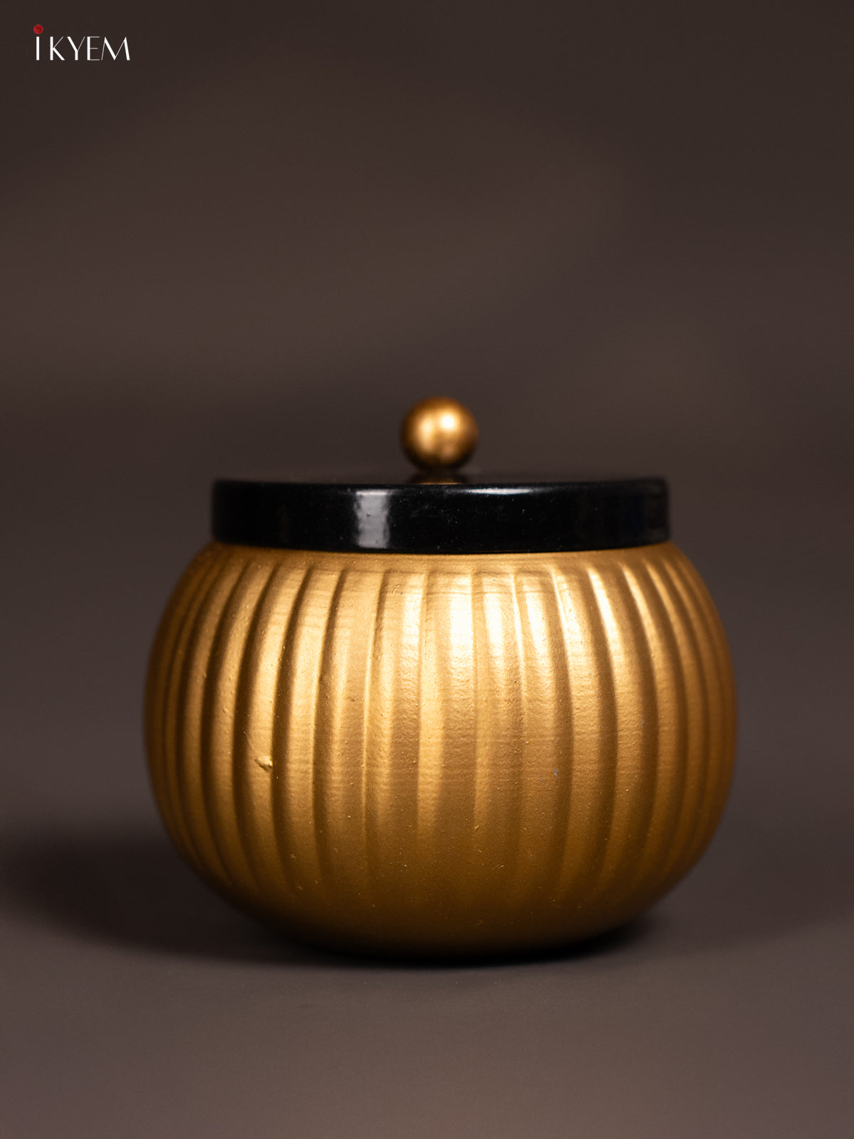 3.5 Inch Gold Ribbed Metal Storage Jar with Black Lid