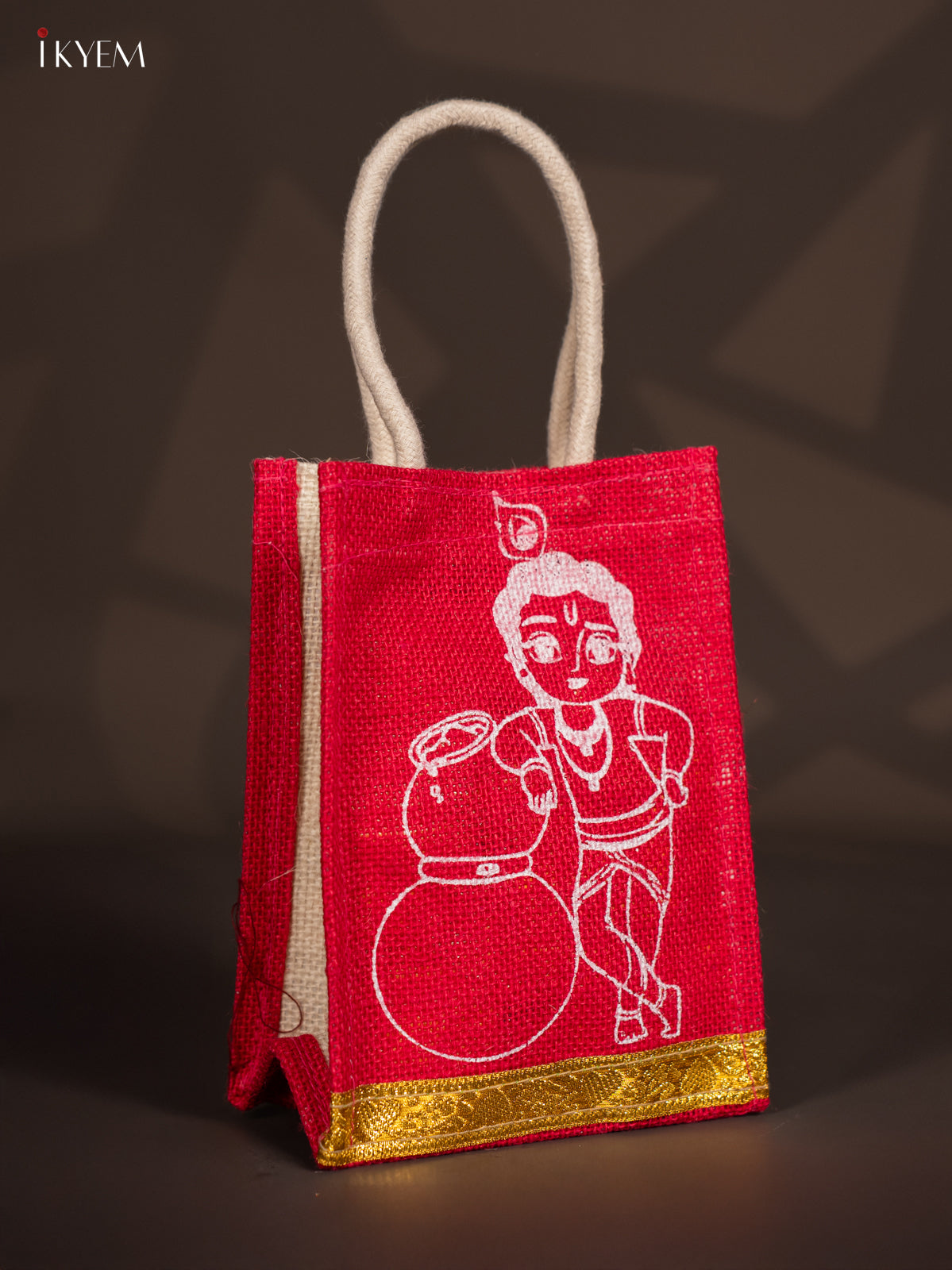 Charming Krishna Printed Red Jute Bags With Zari Border
