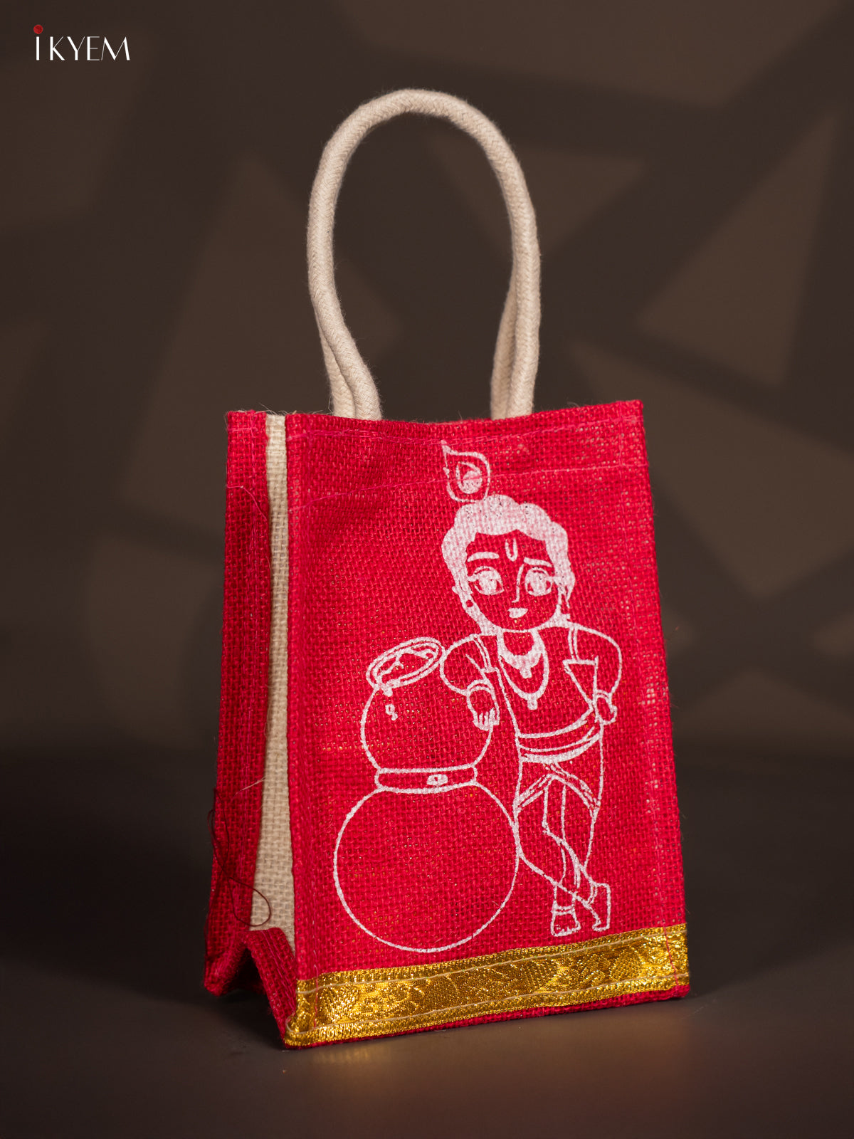 Charming Krishna Printed Red Jute Bags With Zari Border