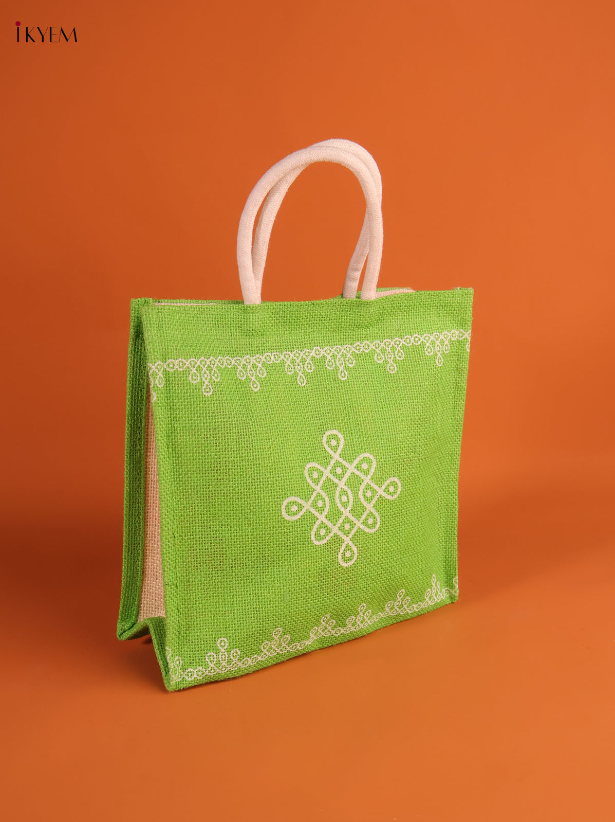 Charming Light Green Jute Bag With Kolam Print 1