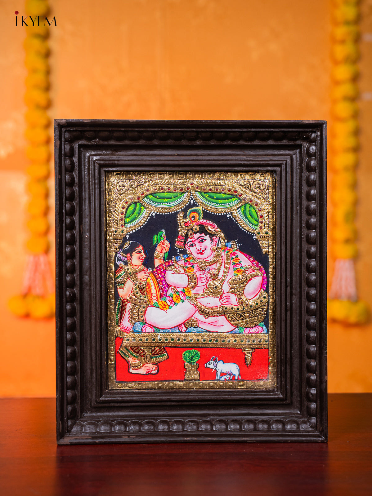 Opulent Tanjore painting Of Lord Krishna Seated In His Throne