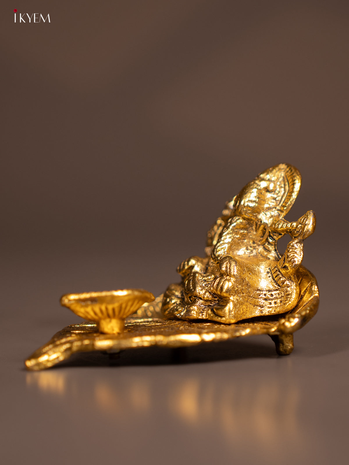 Magnificent Gold Plated Ganesha Idol & Diya In A Small Leaf 2