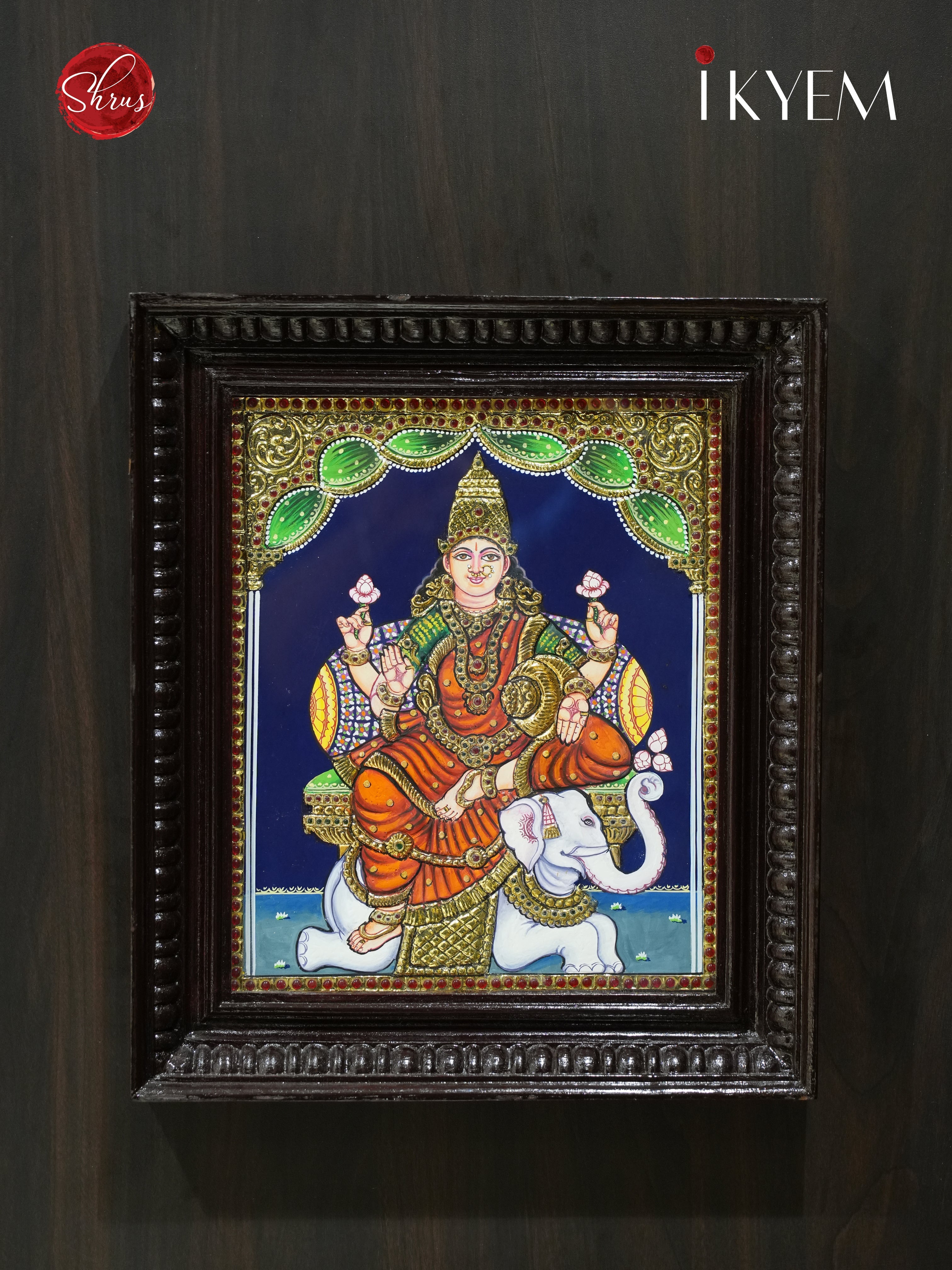 Gaja Lakshmi - Tanjore Painting embelished with Pure Gold Foil, Stones and Mani Frame