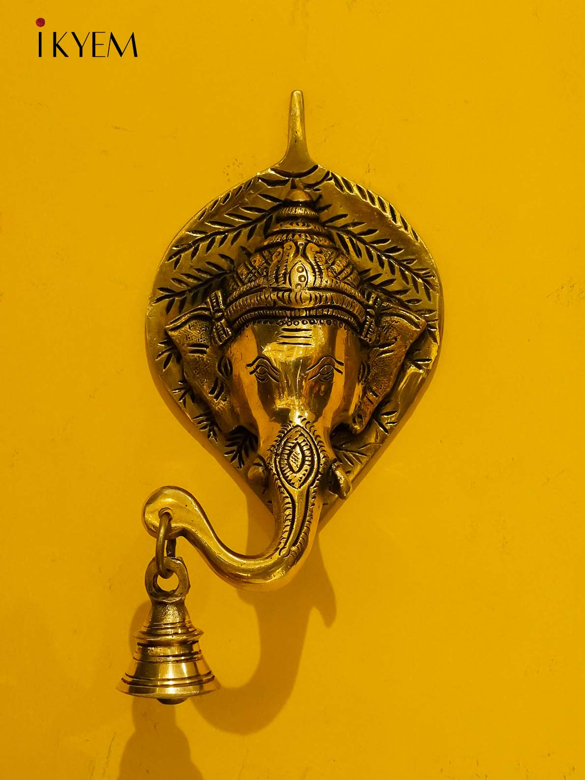 Brass Leaf Ganesha wall hanging with bell