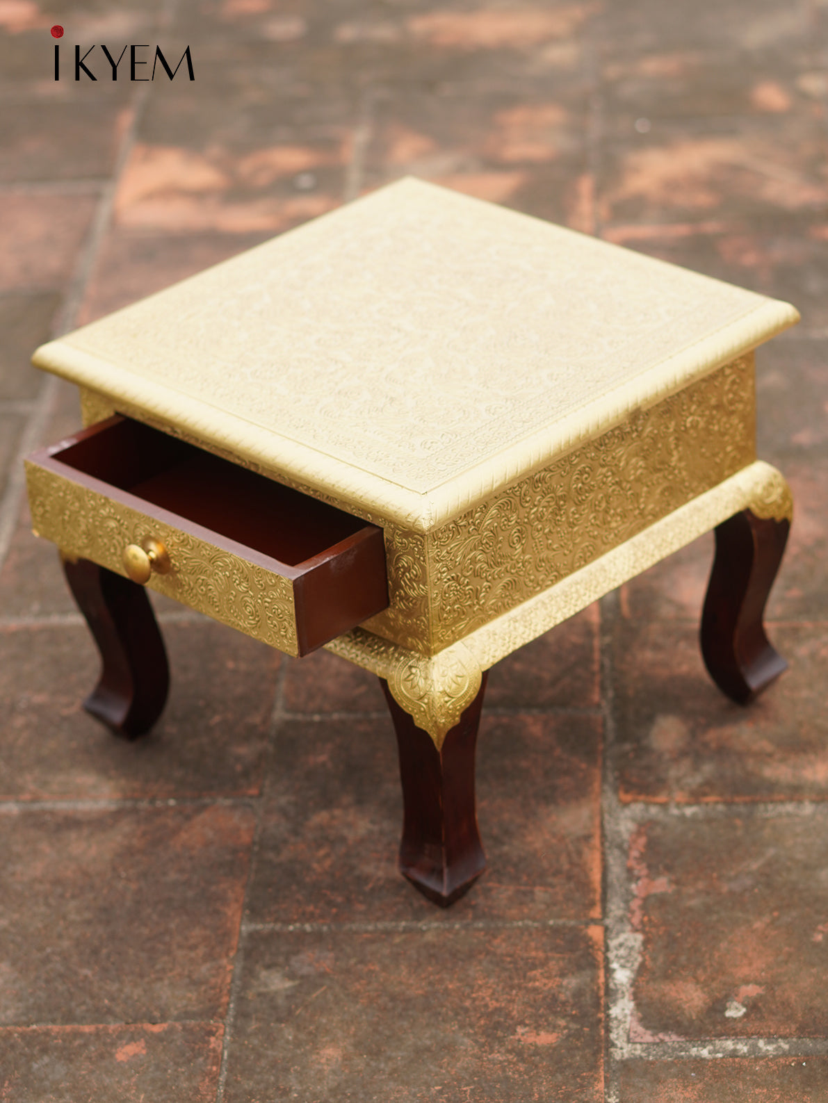 Brass Embellised table with drawer