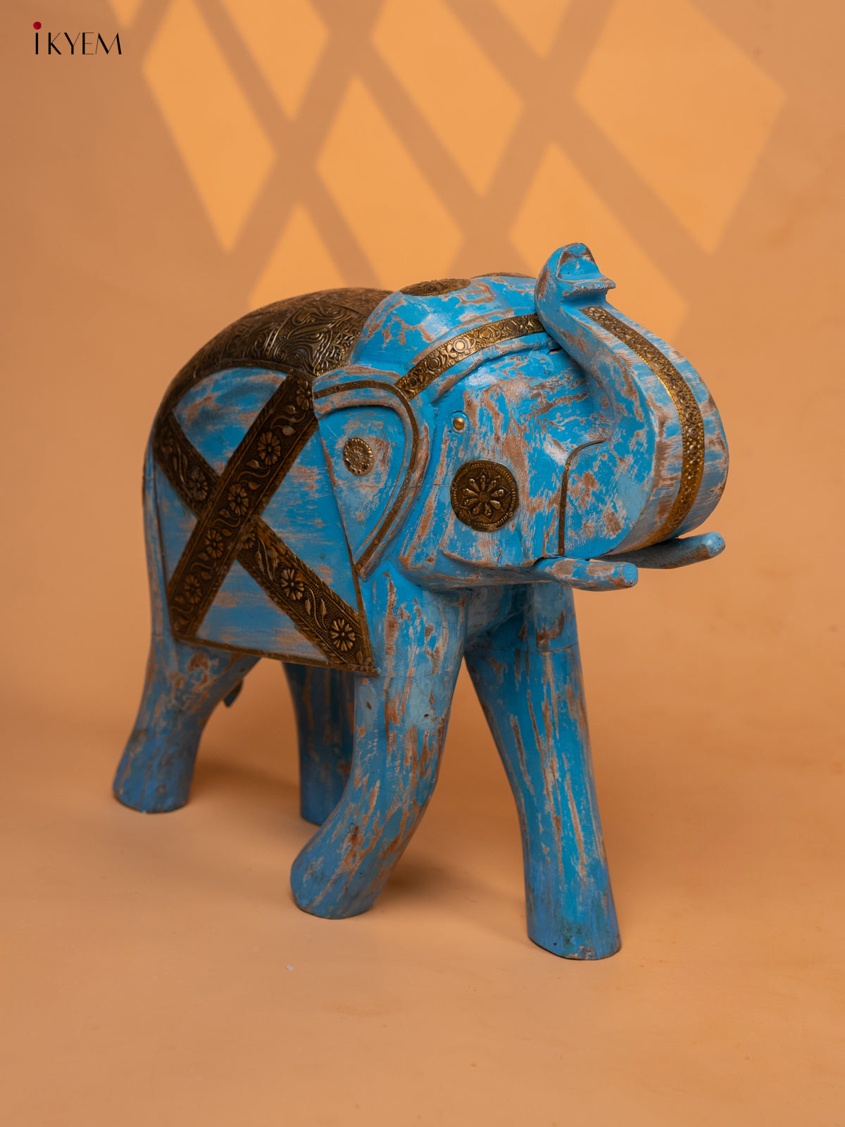 UPWARD TRUNK WOOD ELEPHANT WITH BRASS LADEN