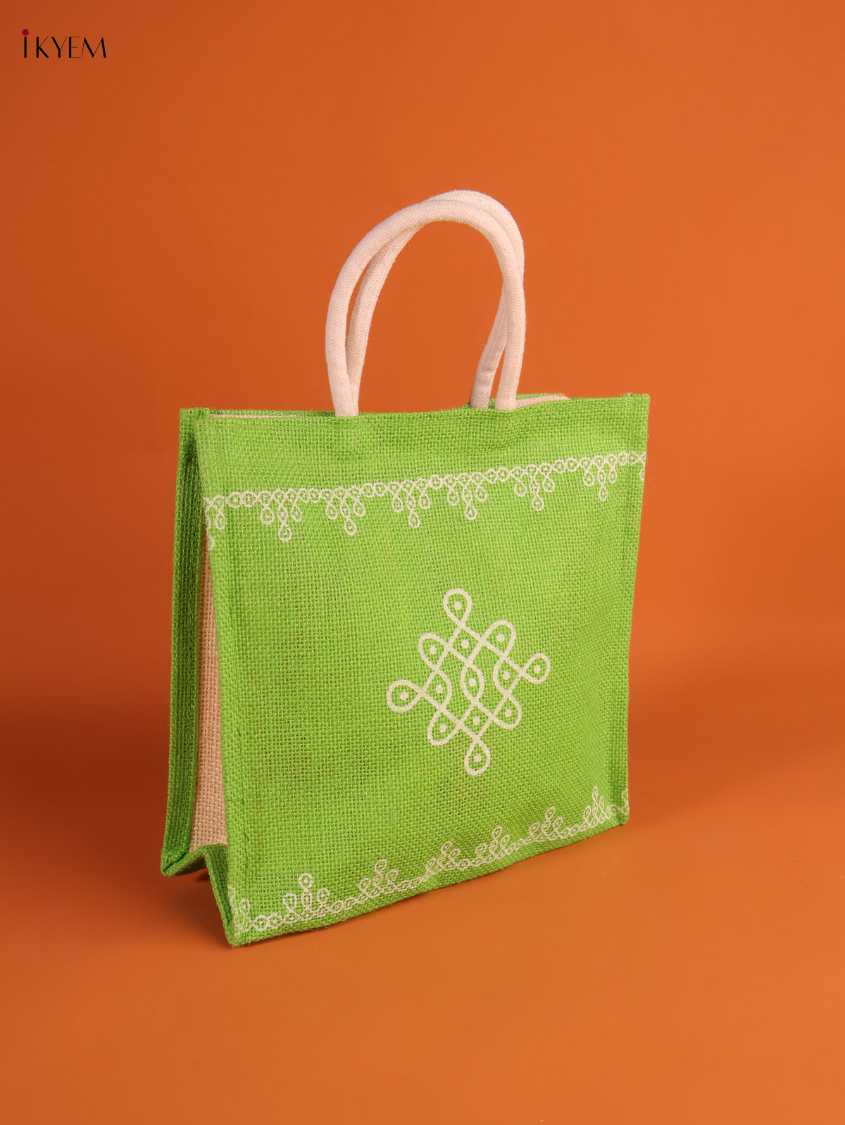 Charming Light Green Jute Bag With Kolam Print 1