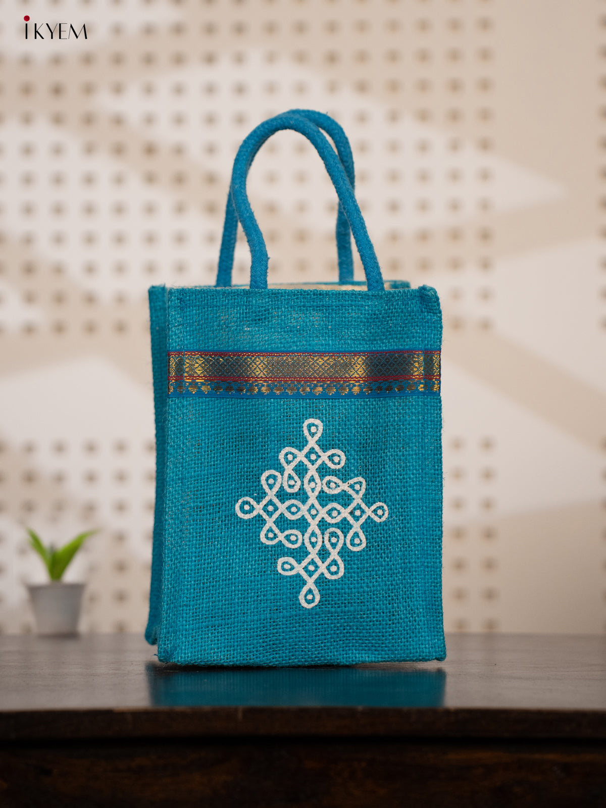 Blue Pink Jute Bags for Return Gifts with Kolam Prints and Zari Accents - KE21120