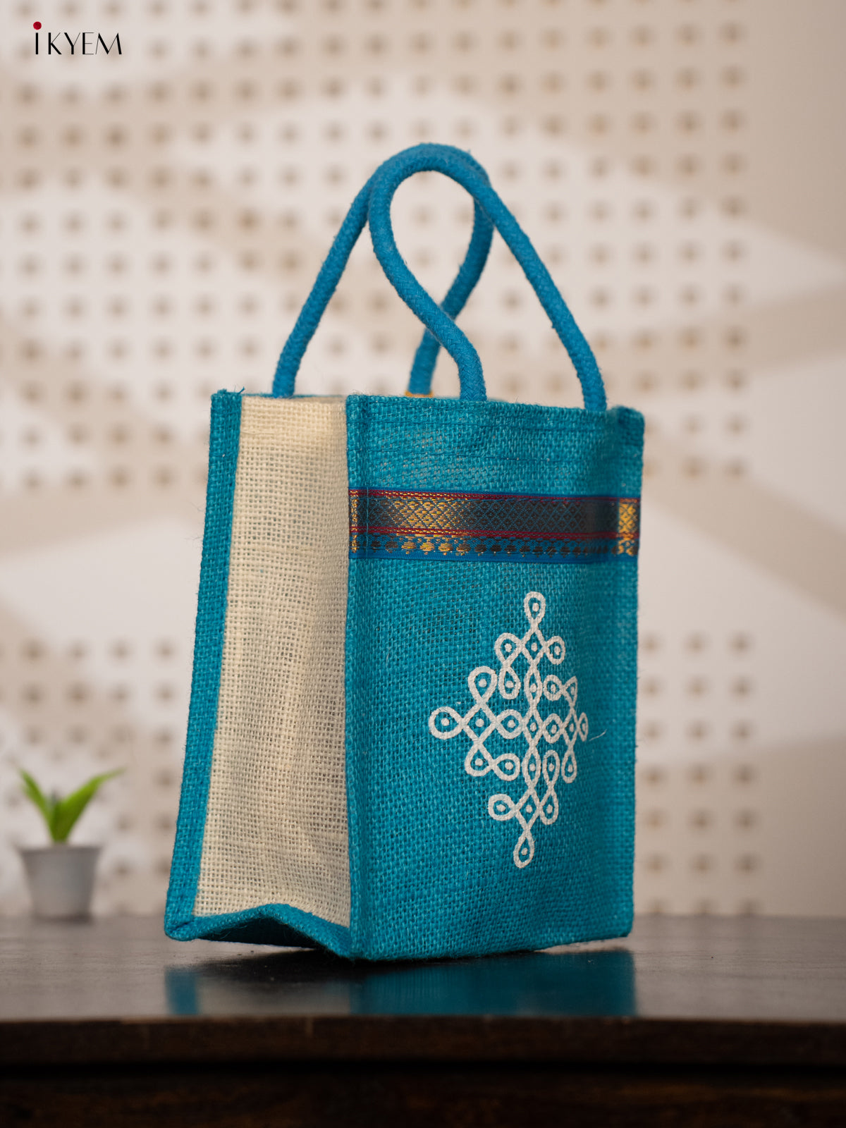 Blue Pink Jute Bags for Return Gifts with Kolam Prints and Zari Accents - KE21120
