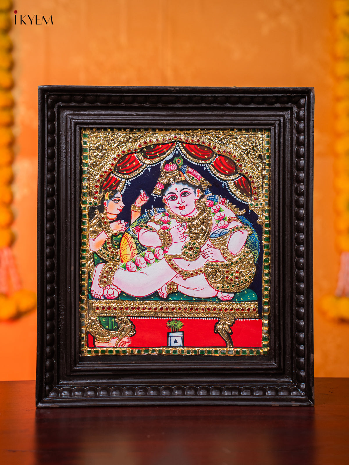 Vibrant Tanjore painting Of Baby Krishna With Butter Pot