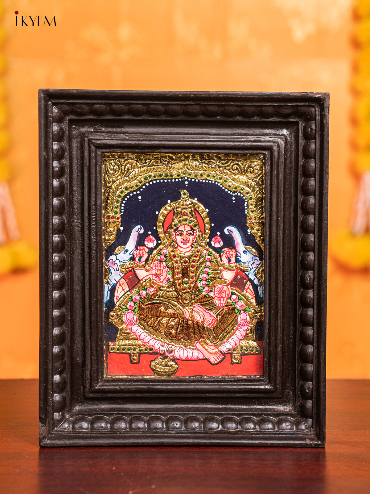 vibrant Gaja Lakshmi Tanjore Painting  