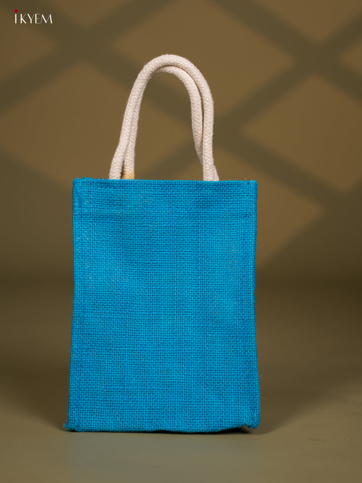 Krishna Printed Blue Jute Bags With Zari Border 
