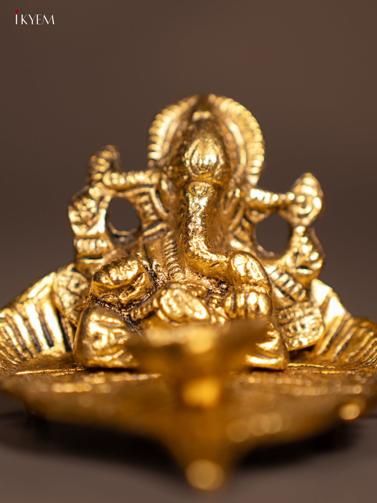 Magnificent Gold Plated Ganesha Idol & Diya In A Small Leaf 3