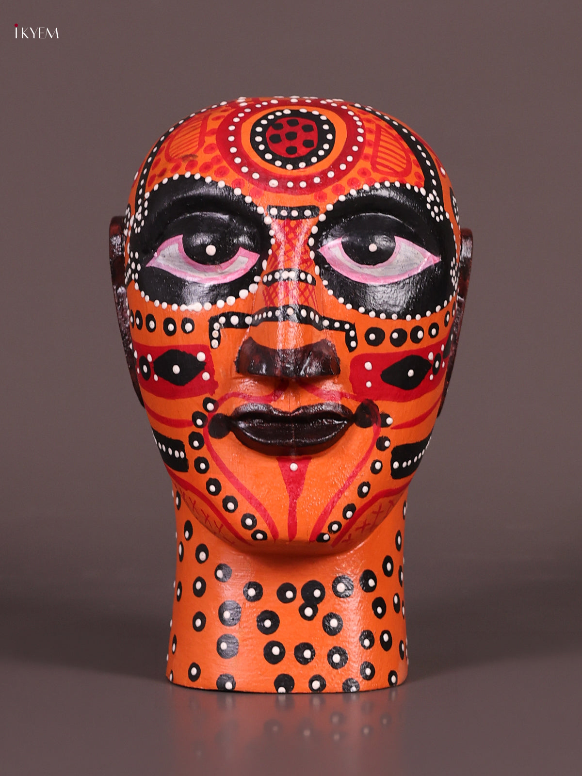 Ornate Orange Hand Painted Theyyam Wooden Idol 