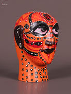 Ornate Orange Hand Painted Theyyam Wooden Idol 1